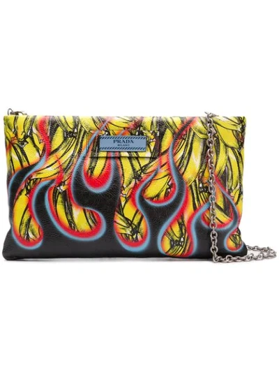 Shop Prada Banana Flame Clutch In Yellow