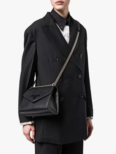 Shop Prada Monochrome Saffiano Bag In Black