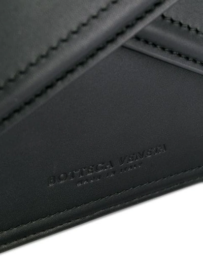 Shop Bottega Veneta Clutch Mit Faltdesign In Black