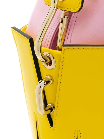 Shop Msgm Small M Bucket Bag In Yellow