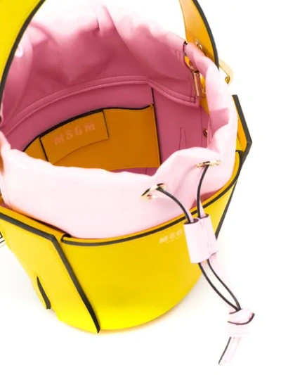 Shop Msgm Small M Bucket Bag In Yellow