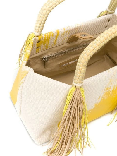 Shop Issey Miyake Tasseled Tote In Yellow