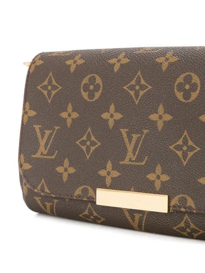 Shop Pre-owned Louis Vuitton Monogram Eva Clutch - Farfetch In Brown
