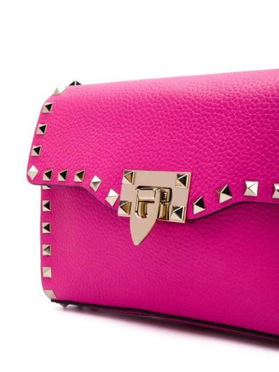 Shop Valentino Garavani Rockstud Crossbody Bag In Pink