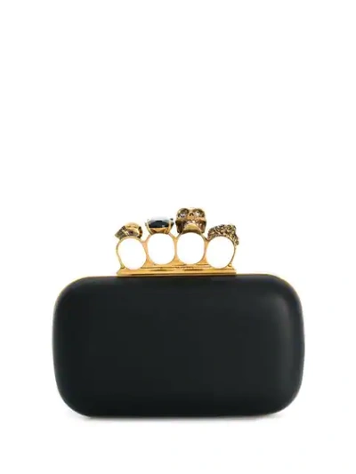 Shop Alexander Mcqueen Four Ring Clutch In Black