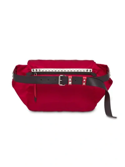 Shop Prada Studded Belt Bag In Red