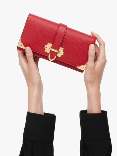 Shop Prada Saffiano Mini Bag In Red