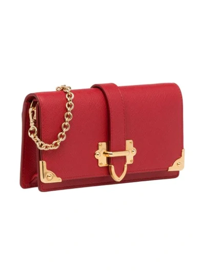 Shop Prada Saffiano Mini Bag In Red