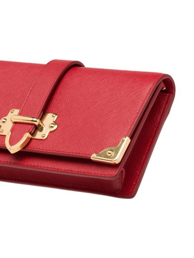 Shop Prada Saffiano Mini Bag In Red