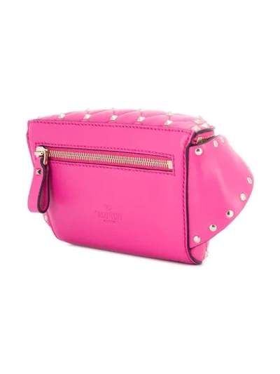 Shop Valentino Garavani Rockstud Spike Belt Bag - Pink