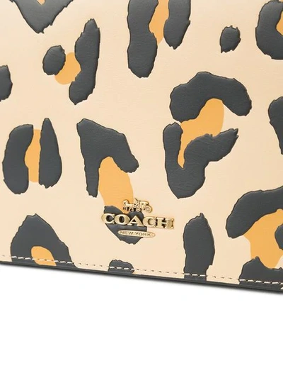 Shop Coach Leopard Print Foldover Clutch In Brown