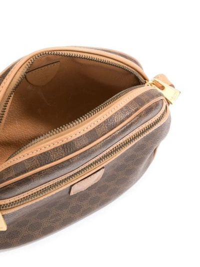Shop Celine Macadam Pattern Crossbody Bag In Brown