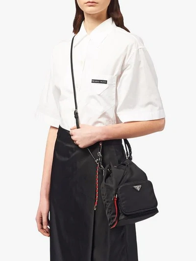 Shop Prada Studded-strap Shoulder Bag In Black