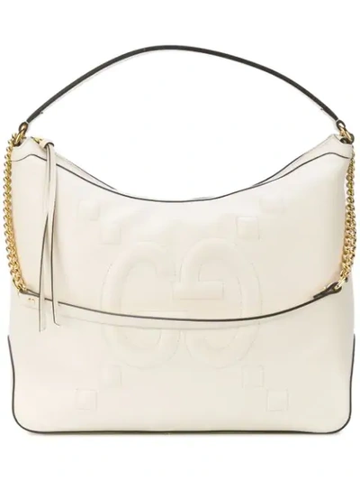 Shop Gucci Embossed Gg Hobo Bag - White
