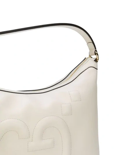 Shop Gucci Embossed Gg Hobo Bag - White