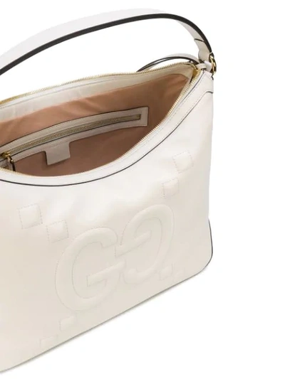 Shop Gucci Embossed Gg Hobo Bag - White