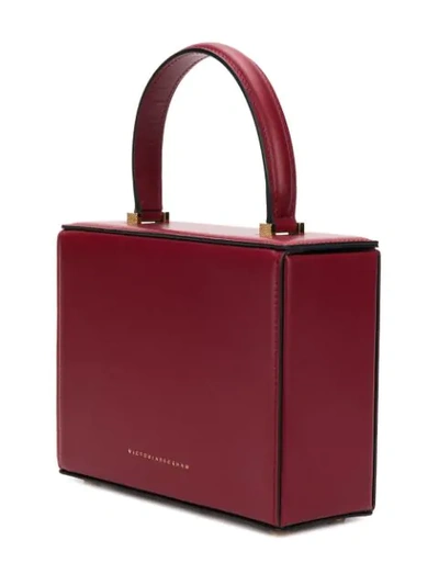 Shop Victoria Beckham Vanity Top Handle Bag - Red