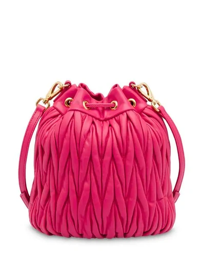 Shop Miu Miu Matelassé Bucket Bag In Pink