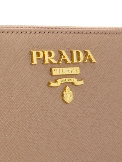 Shop Prada Mini Crossbody Bag In F0236 Cipria