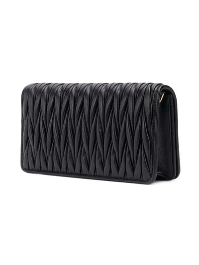 Shop Miu Miu Chain Wallet Bag In Black