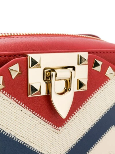 Shop Valentino Rockstud Striped Crossbody In Red