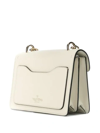 Shop Valentino Garavani Uptown Shoulder Bag In White