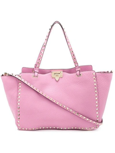 Shop Valentino Garavani Rockstud Trapeze Tote In Pink