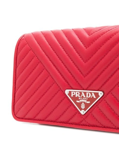 Shop Prada Quilted Mini Crossbody Bag In Red