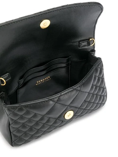 Shop Versace Quilted Medusa Crossbody Bag In Black