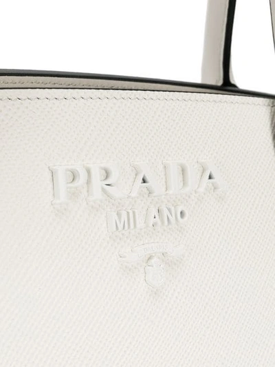 Shop Prada Monochrome Saffiano Bag In White