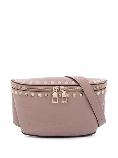 Shop Valentino Rockstud Belt Bag In Pink