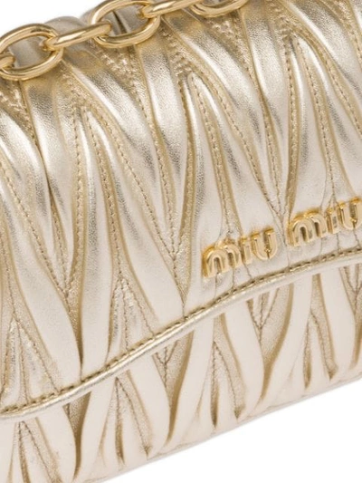 Shop Miu Miu Matelassé Textured Shoulder Bag In Gold
