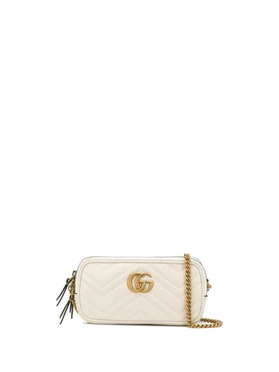 Shop Gucci Mini Gg Marmont Crossbody Bag In Neutrals