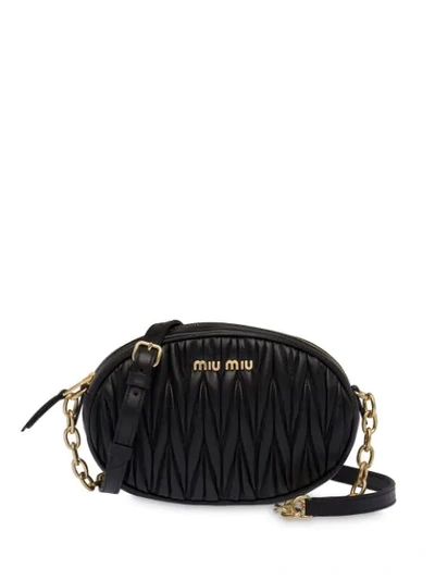 Shop Miu Miu Matelassé Oval-shape Shoulder Bag In Black