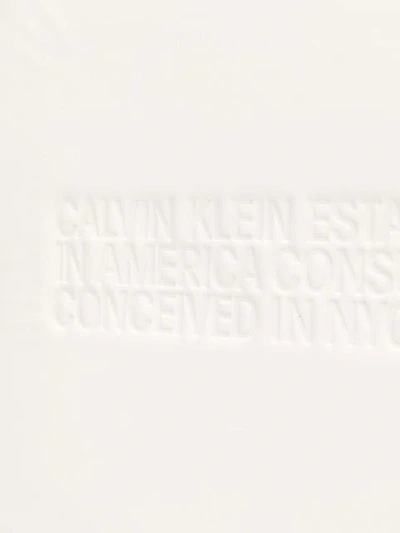 Shop Calvin Klein 205w39nyc Embossed Geometric Clutch In Black
