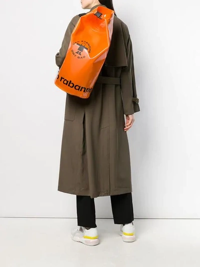Shop Rabanne Logo Print Bucket Backpack In Orange