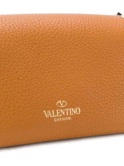 Shop Valentino Garavani Rockstud Spike Bag In Neutrals