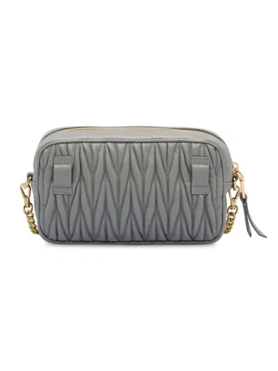 Shop Miu Miu Matelassé Belt Bag In F0424 Cloudy Gray