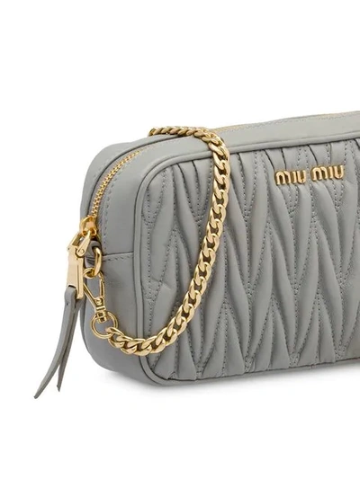 Shop Miu Miu Matelassé Belt Bag In F0424 Cloudy Gray