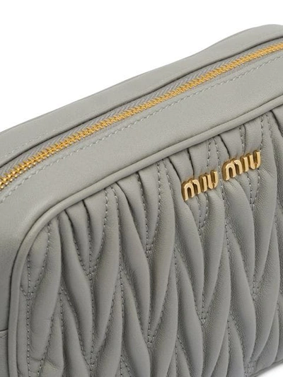 Shop Miu Miu Matelassé Belt Bag In F0424 Cloudy Gray