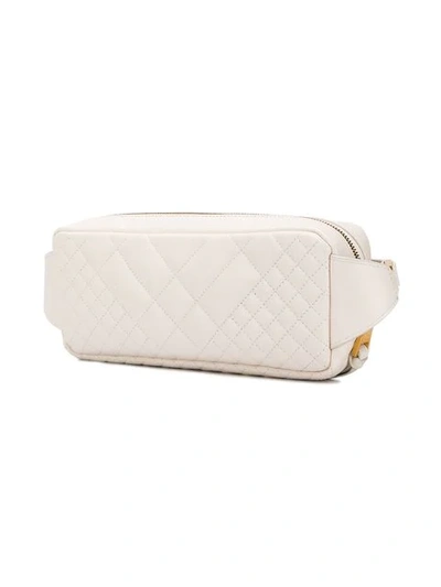 Shop Versace Quilted Belt Bag In White