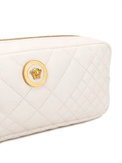 Shop Versace Quilted Belt Bag In White