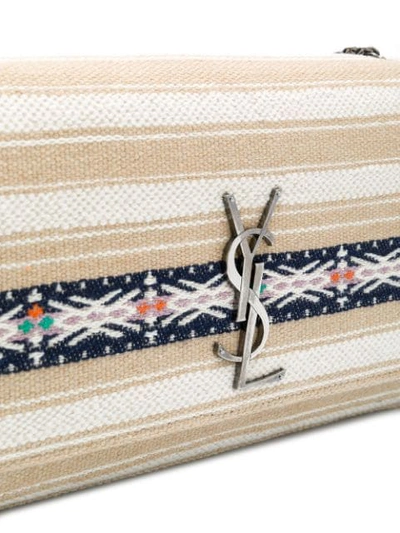 Shop Saint Laurent Striped Logo Shoulder Bag - Neutrals