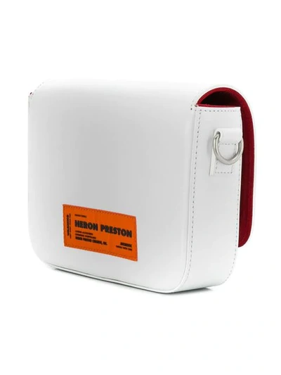 Shop Heron Preston Logo Crossbody Bag In White