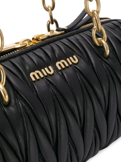 Shop Miu Miu Logo Matelassé Bag - Black