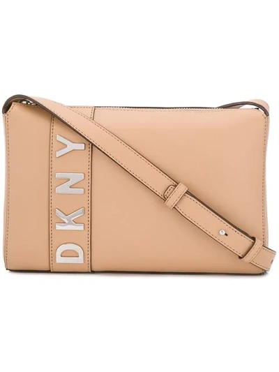 Shop Dkny Logo Crossbody Bag In Neutrals