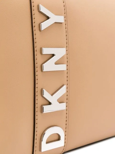 Shop Dkny Logo Crossbody Bag In Neutrals
