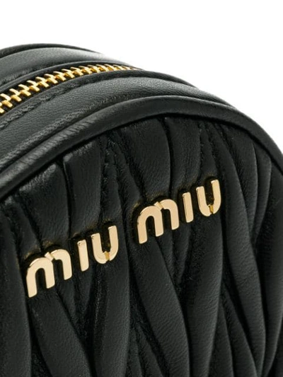 Shop Miu Miu Round Matelassé Belt Bag In F0002 Nero