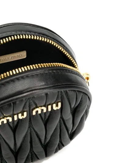 Shop Miu Miu Round Matelassé Belt Bag In F0002 Nero
