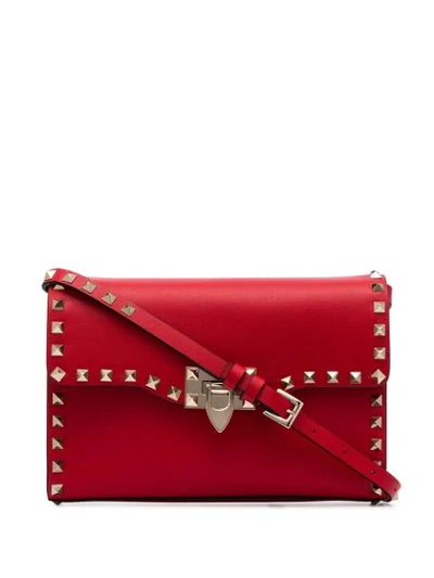 Shop Valentino Garavani Rockstud Crossbody Bag - Pink